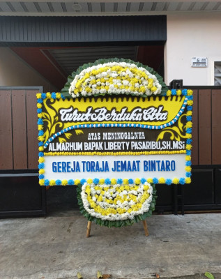 Papan Bunga Duka di Juata Kerikil